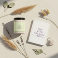 Mindfulness Gift Set with soy candle and journal styled in a serene lifestyle flat lay